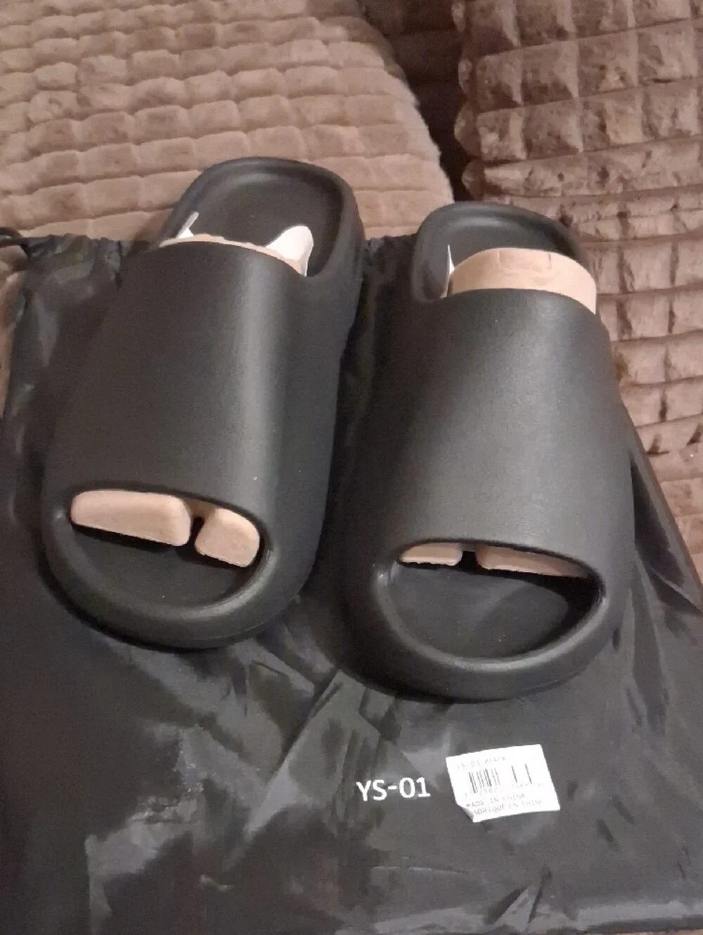 Yeezy Black Slide Sandals with Neutral Beige Liner